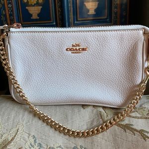 Coach Signature Ivory Alligator Pattern Leather clutch with gold tone chain.
